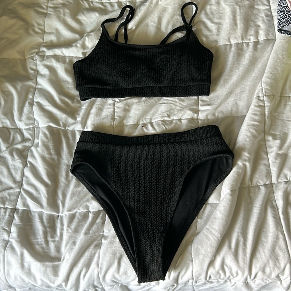 Black bikini,high waisted, the top had to be adjusted to be a little smaller.